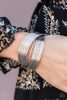 Urban Glam – Silver Crisscross Band Cuff Bracelet - Paparazzi Accessories